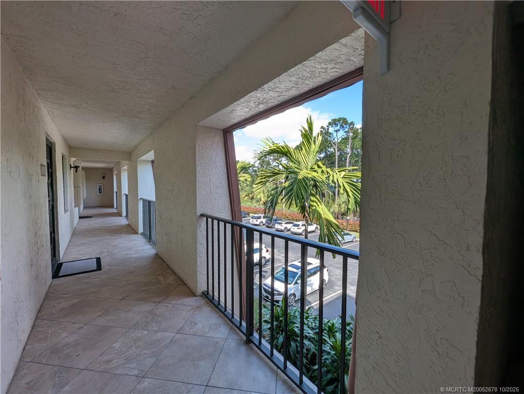 3100 Southeast Pruitt Road, Unit B301 Port St. Lucie, FL 34952 - Photo 8 of 48 a view of a porch