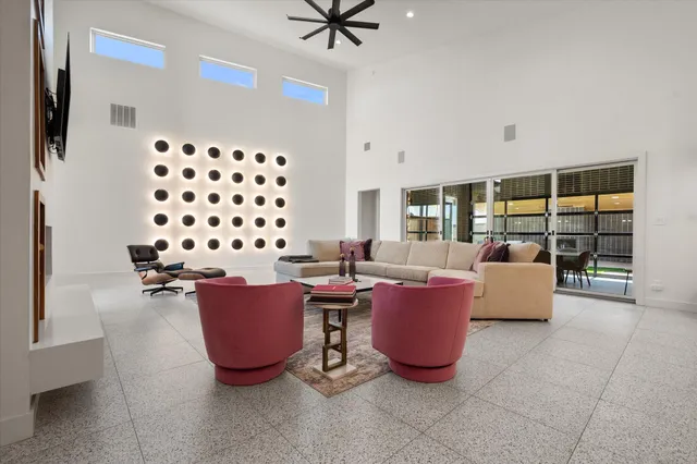 a living room with furniture and a window