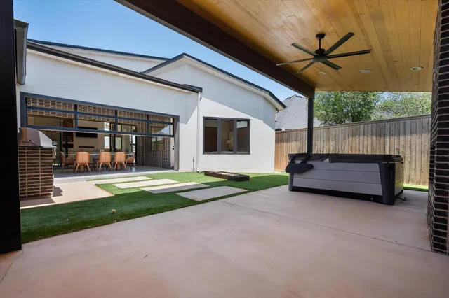 a view of yard with patio