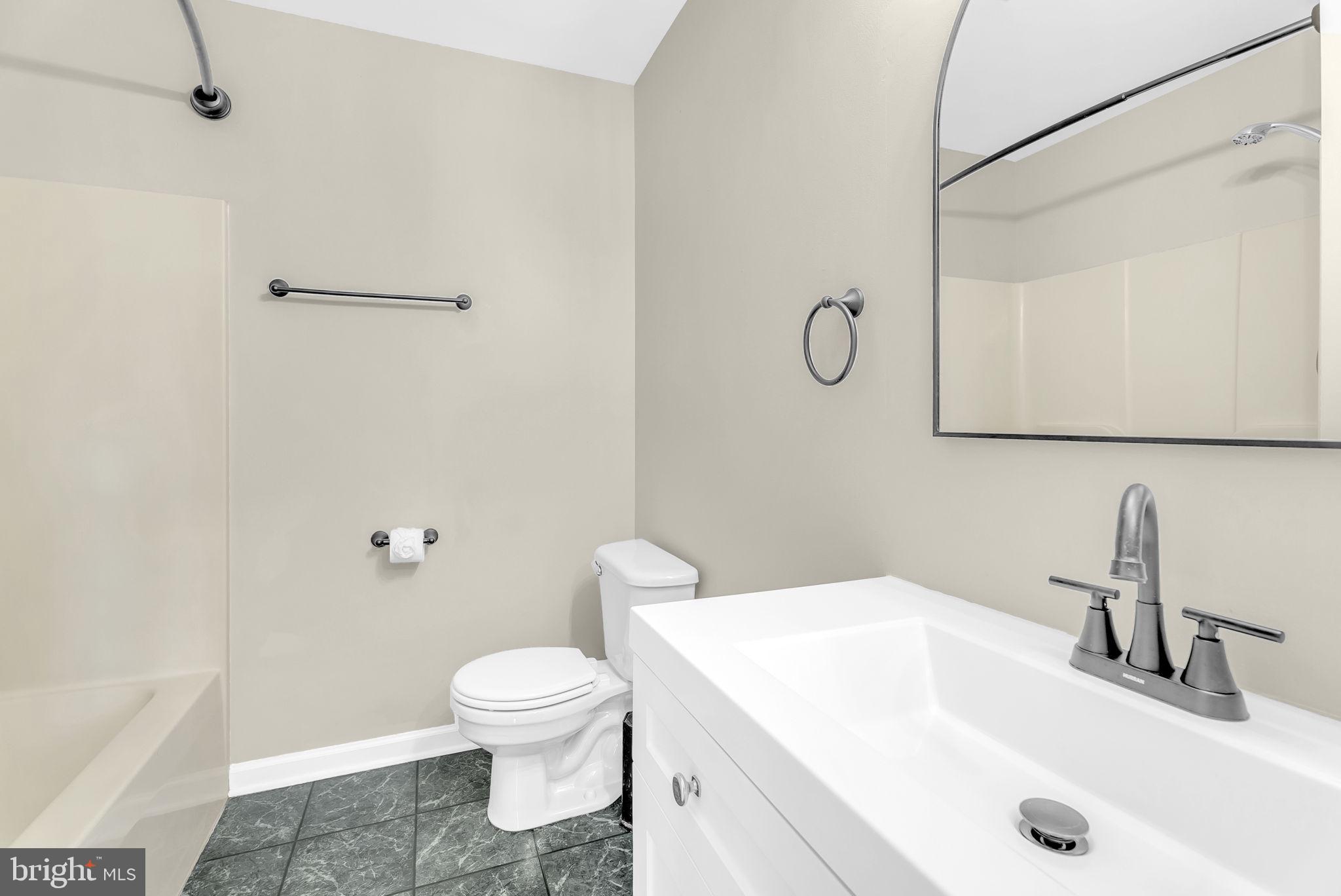 555 Oak Lee Drive Ranson, WV 25438 - Photo 19 of 40 EnSuite bathroom with shower