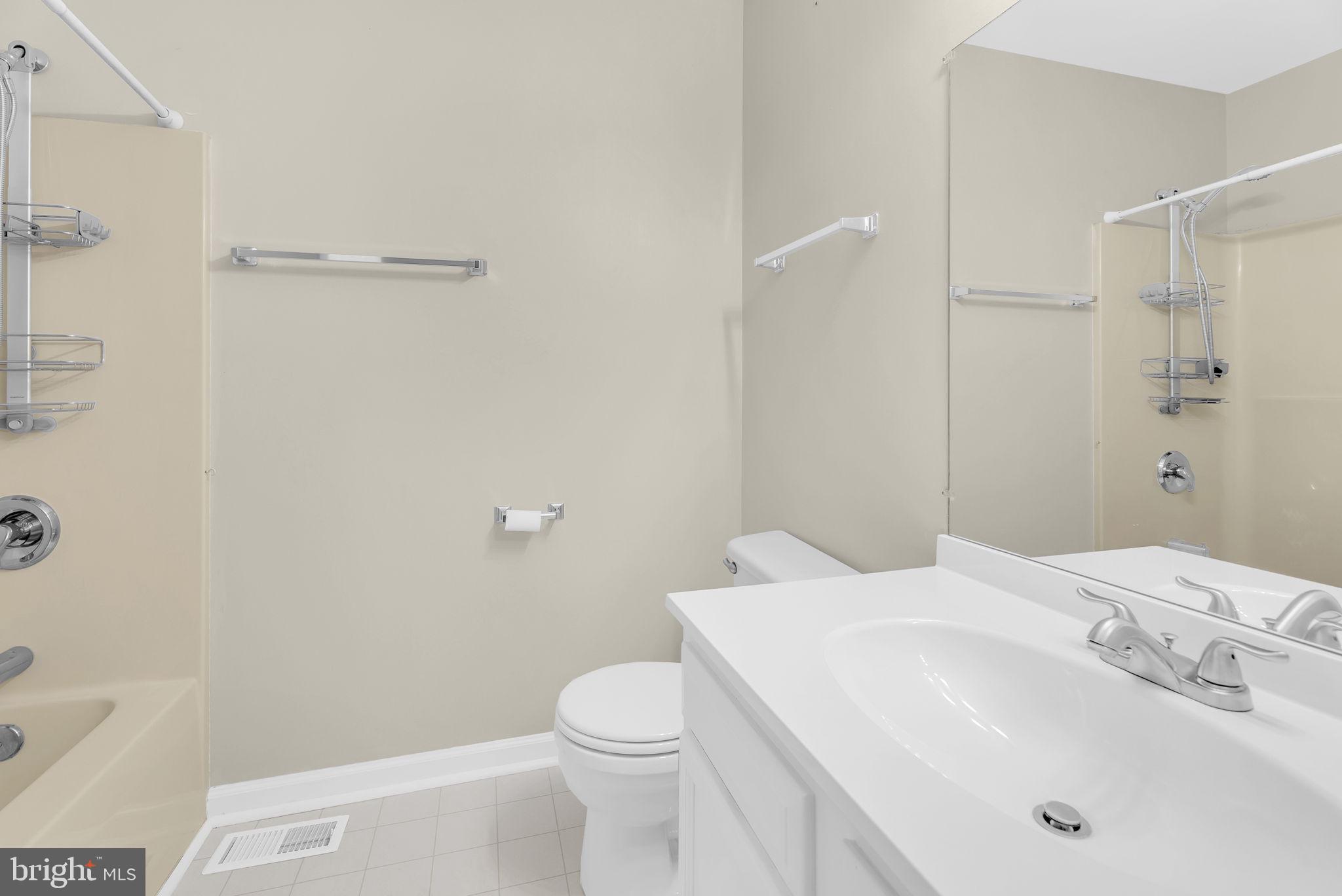 555 Oak Lee Drive Ranson, WV 25438 - Photo 23 of 40 Main hall bathroom