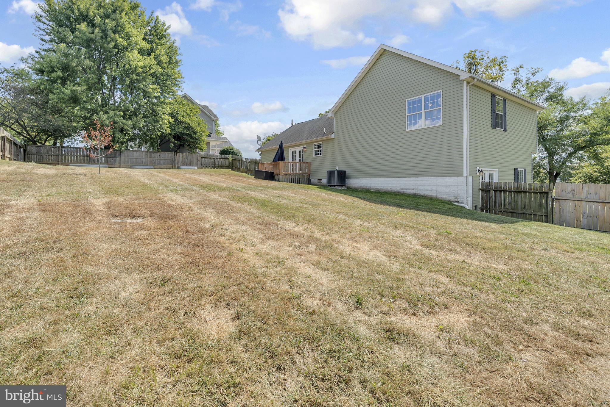 555 Oak Lee Drive Ranson, WV 25438 - Photo 38 of 40 A pool? Hardscaping with fire pit?