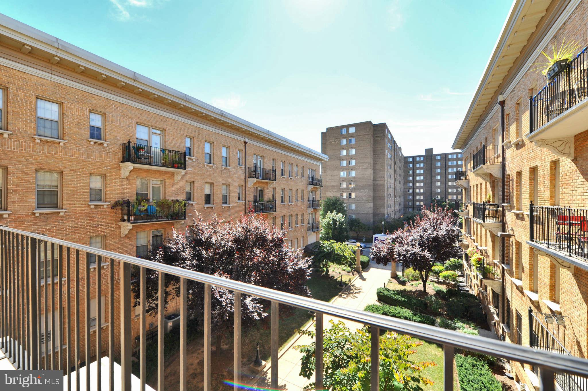 1401 Columbia Road Northwest, Unit 302 Washington, DC 20009 - Photo 28 of 30 a view of a city from a balcony