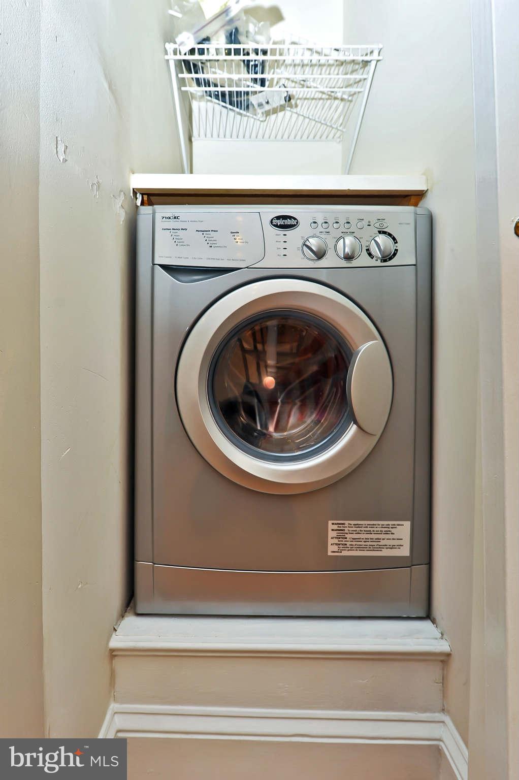 1401 Columbia Road Northwest, Unit 302 Washington, DC 20009 - Photo 29 of 30 a close view of washer and dryer