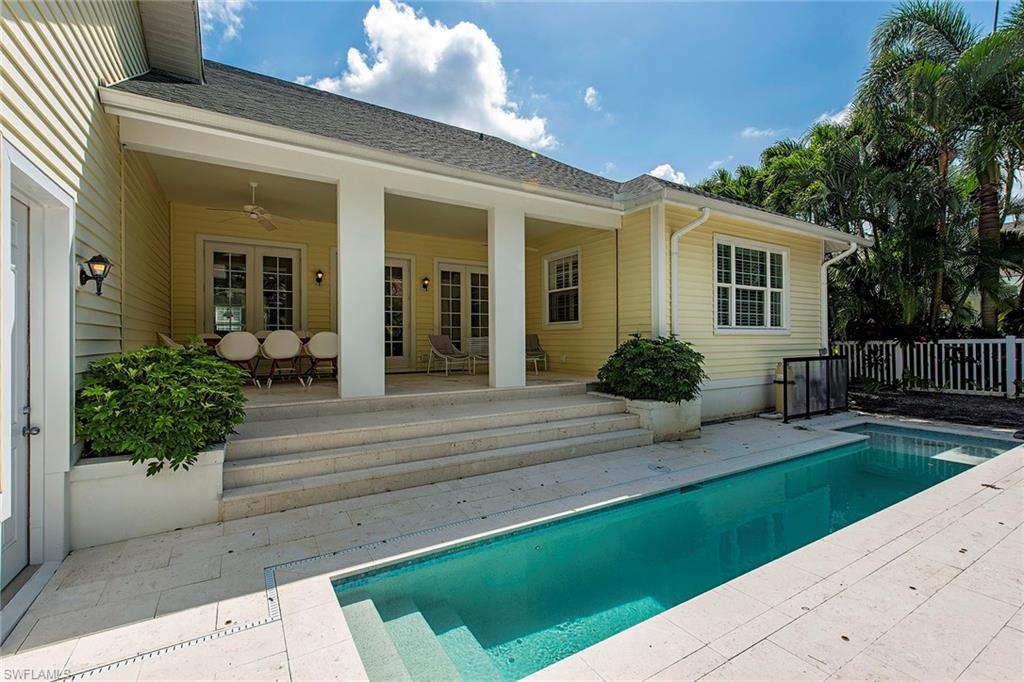 860 7th Street South Naples, FL 34102 - Photo 13 of 13 a view of a house with a yard