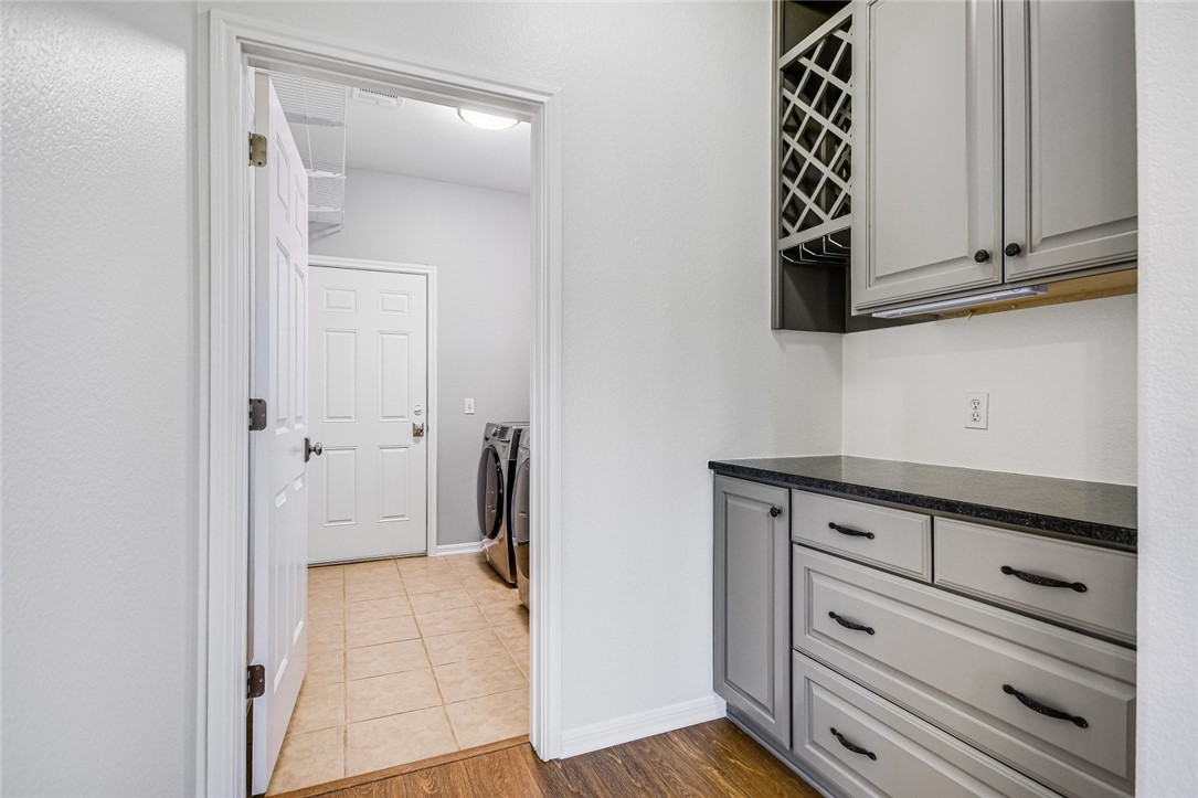 6405 York Bridge Circle Austin, TX 78749 - Photo 14 of 34 a view of cabinets with wooden floor