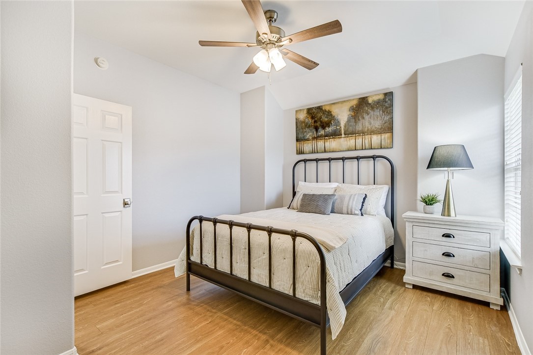 6405 York Bridge Circle Austin, TX 78749 - Photo 18 of 34 a bedroom with a bed and a window