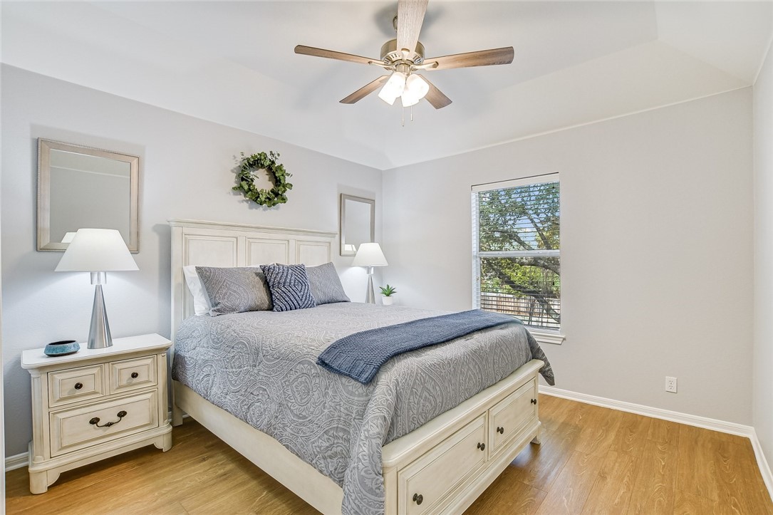 6405 York Bridge Circle Austin, TX 78749 - Photo 20 of 34 a bedroom with a bed and a window