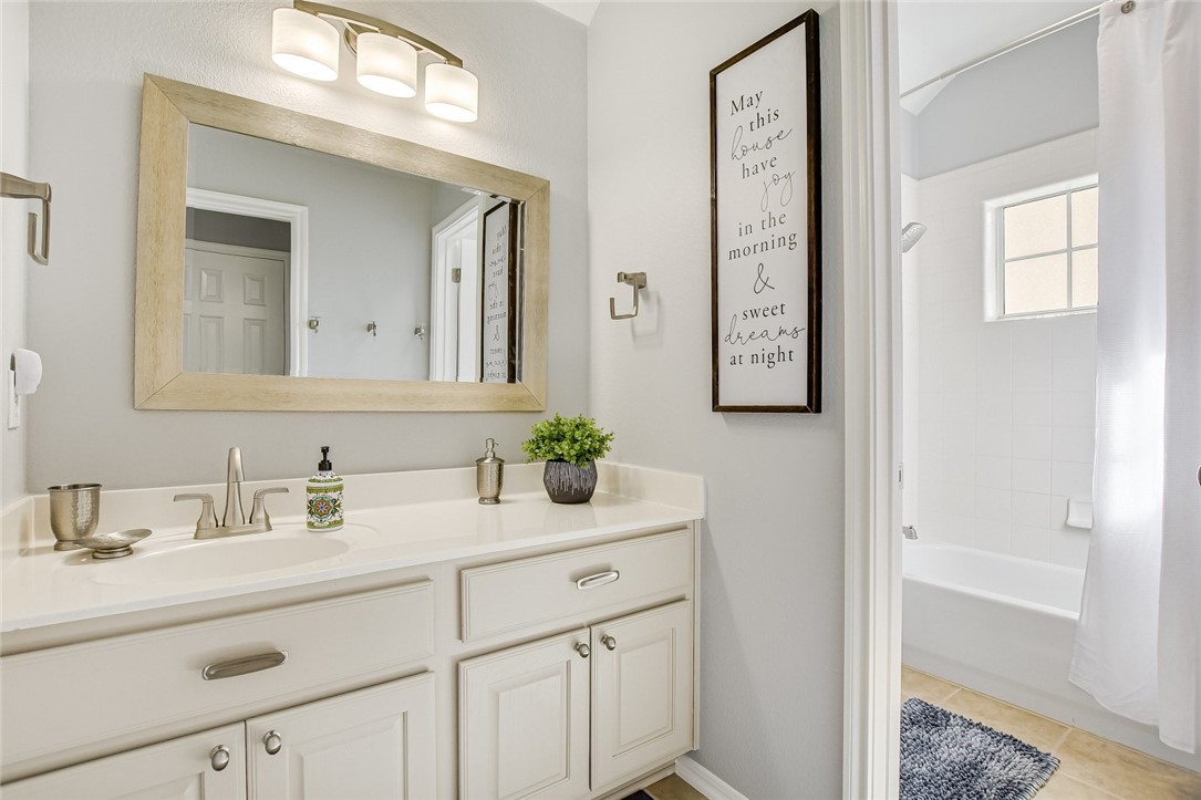 6405 York Bridge Circle Austin, TX 78749 - Photo 21 of 34 a bathroom with a sink and a mirror