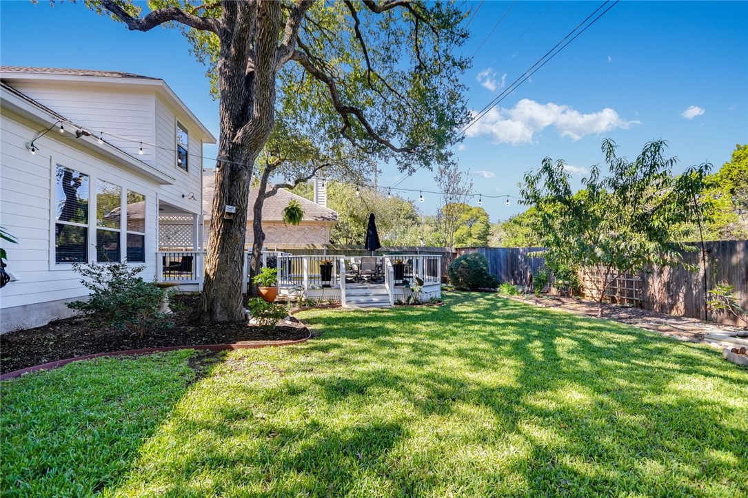 6405 York Bridge Circle Austin, TX 78749 - Photo 30 of 34 a front view of a house with garden