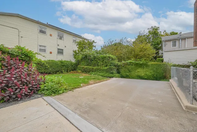 a view of a back yard of the house