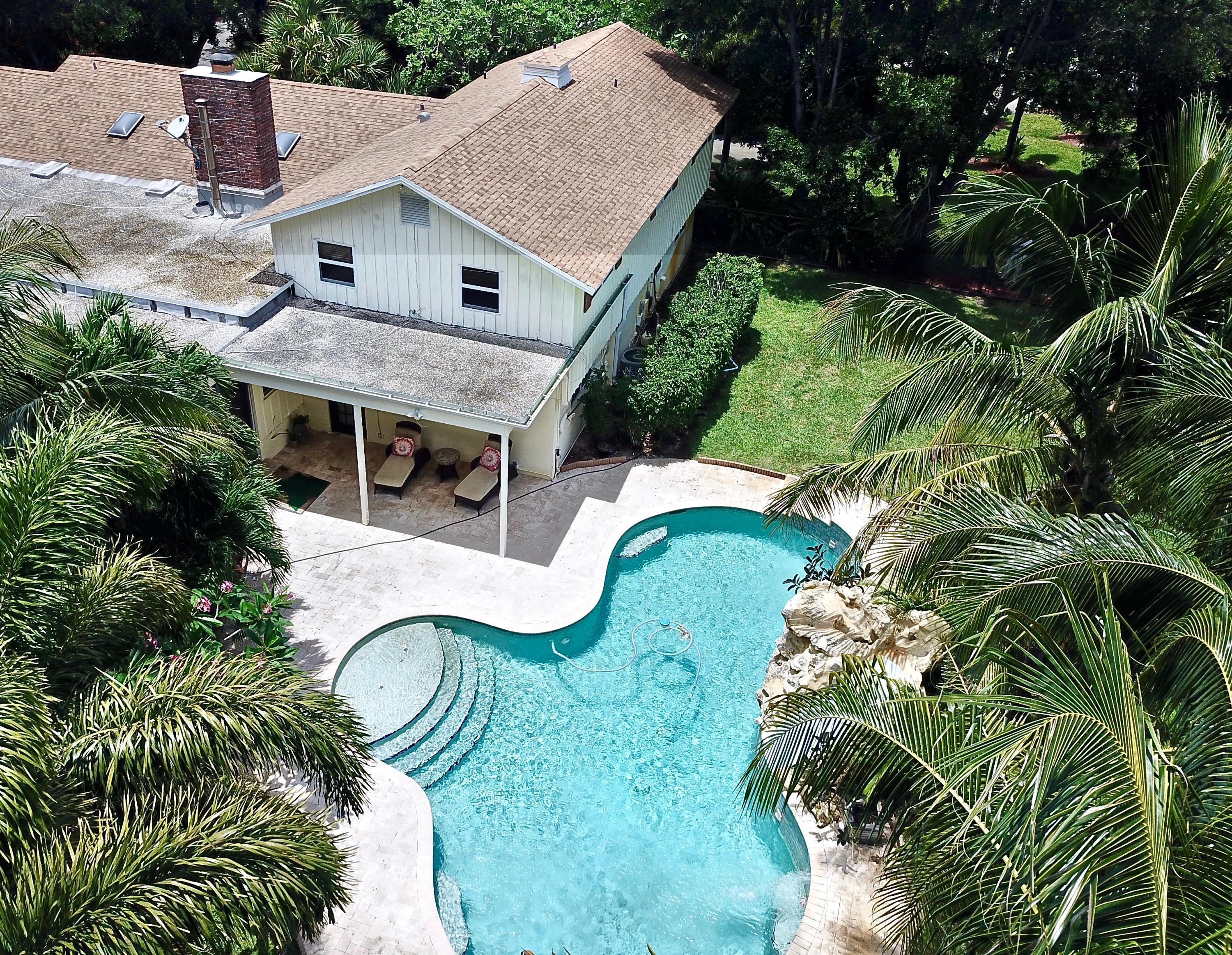 3860 Lone Pine Road Delray Beach, FL 33445 - Photo 34 of 44 side view of pool