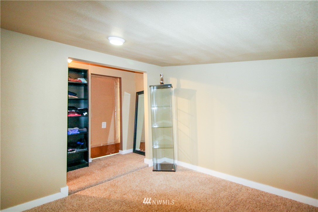 27615 Webster Road East Graham, WA 98338 - Photo 18 of 36 an empty room with closet