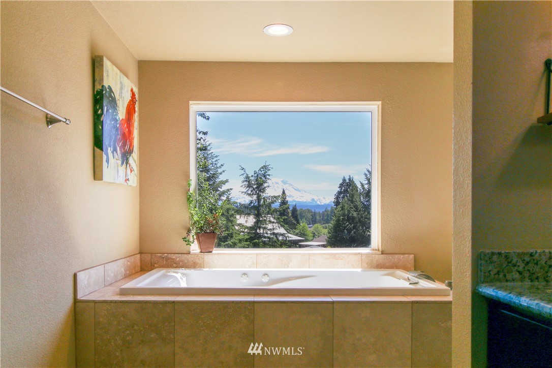 27615 Webster Road East Graham, WA 98338 - Photo 21 of 36 a room with a window
