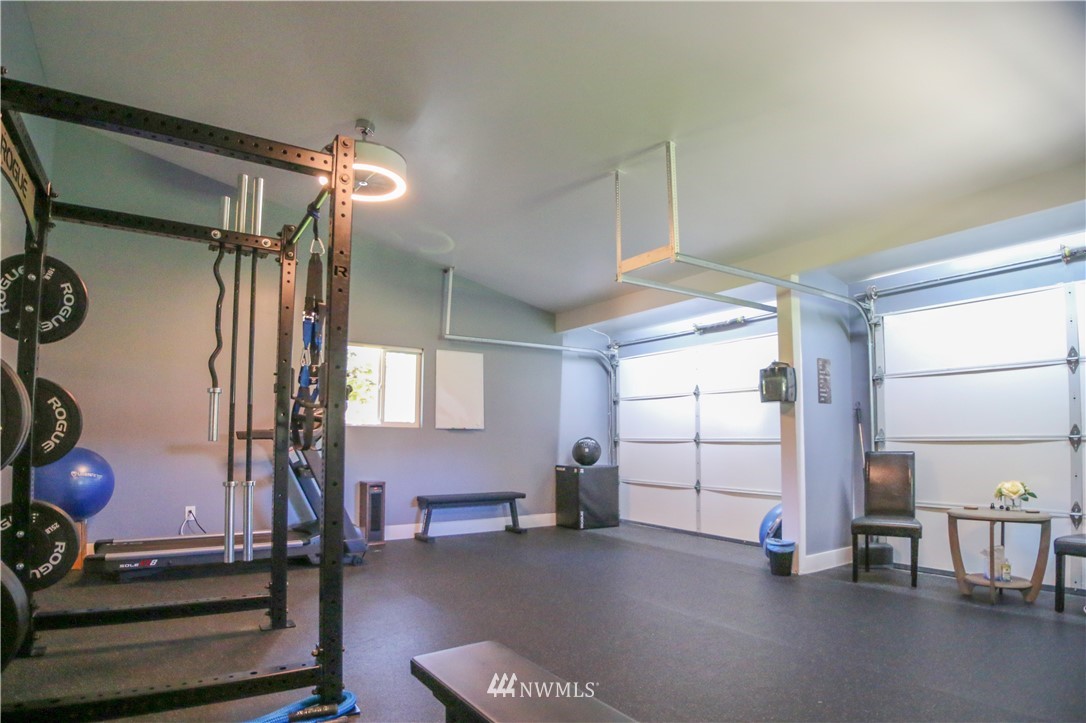 27615 Webster Road East Graham, WA 98338 - Photo 33 of 36 a view of a room with gym equipment