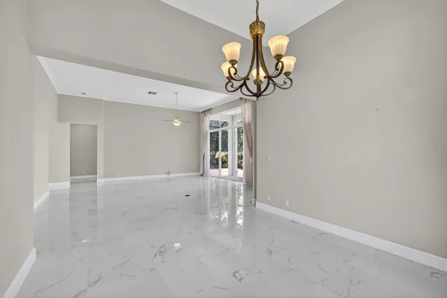 a kitchen with stainless steel appliances a sink stove and refrigerator