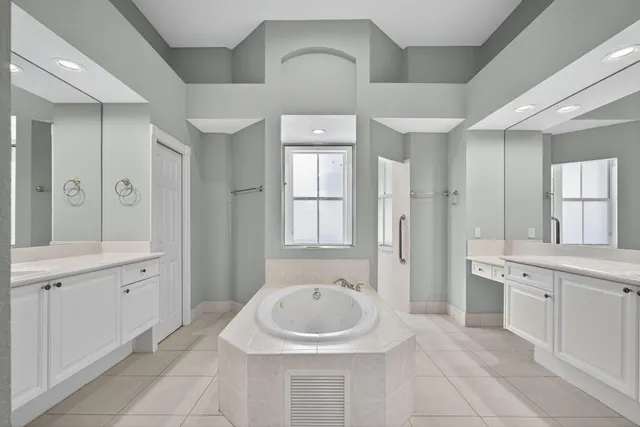 a bathroom with a bathtub and a sink