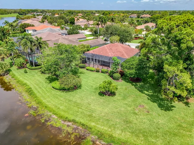 an aerial view of a house with a garden