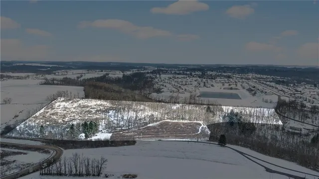 a view of water heater and wooden floor
