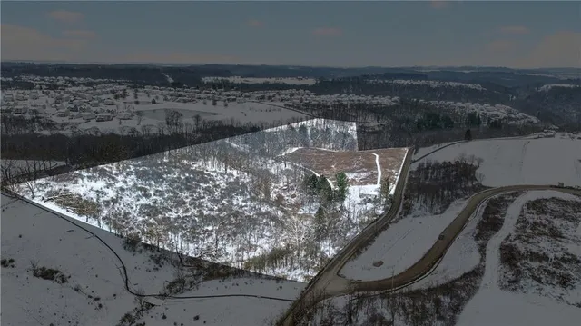 a view of roof with wooden floor