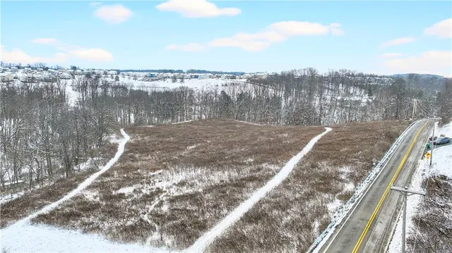 a view of a lake with a city