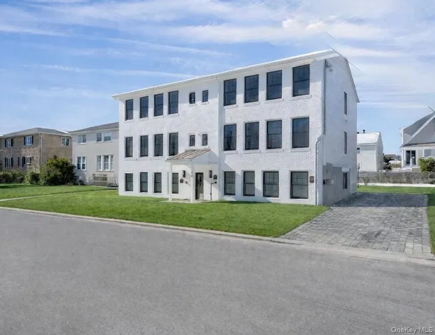 a view of building with yard