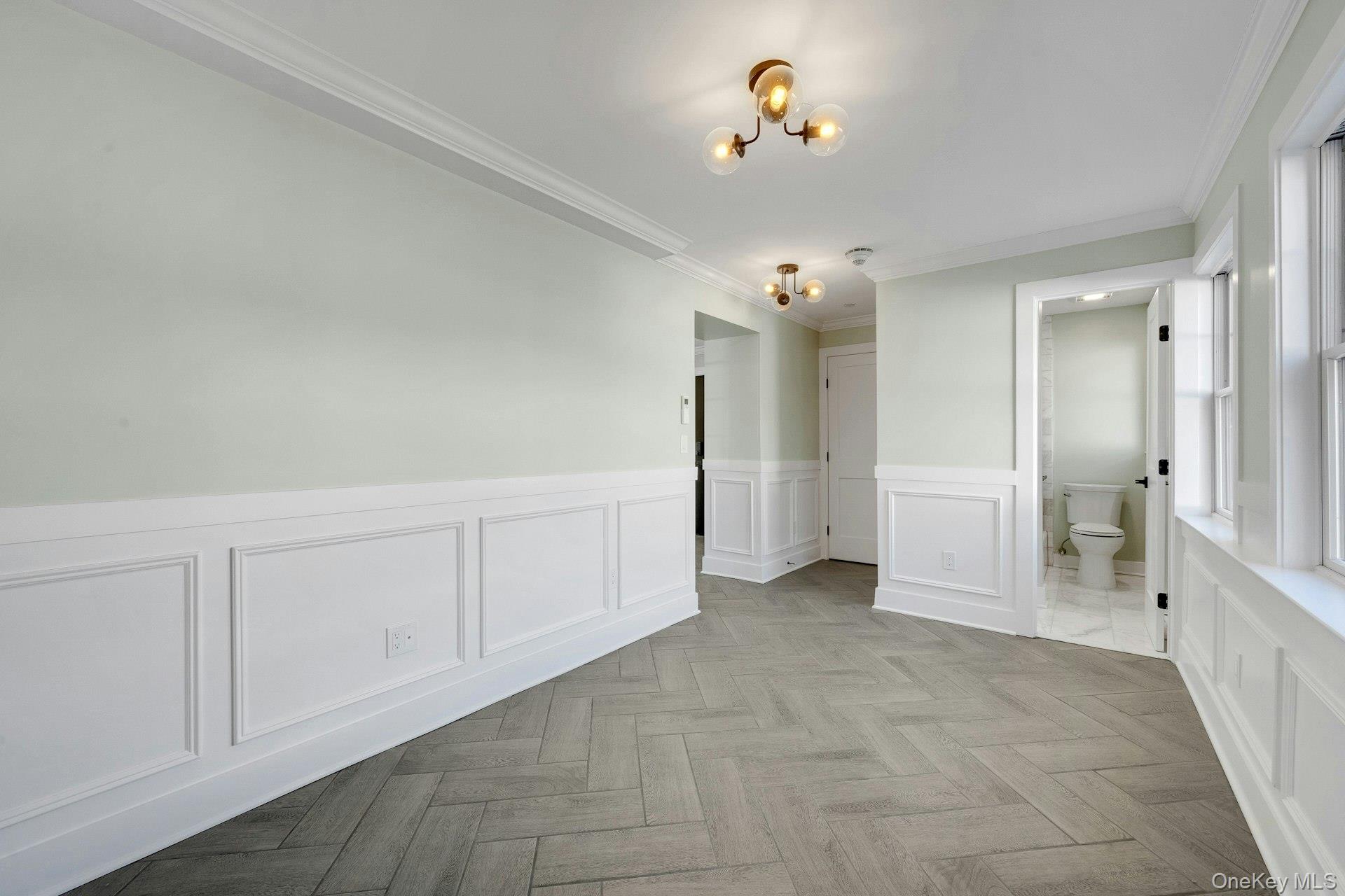 74 Nelson Avenue, Unit 1 Harrison, NY 10528 - Photo 8 of 15 a view of a chandelier fan and entryway