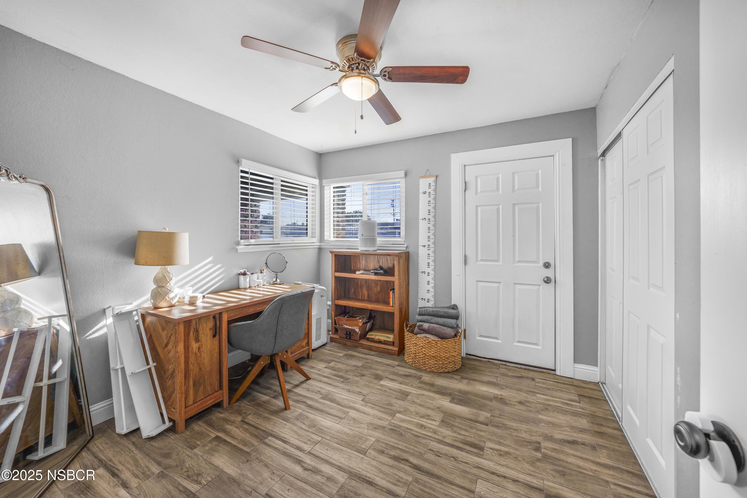 3939 Saturn Avenue Lompoc, CA 93436 - Photo 19 of 26 a bed room with a bed and a table