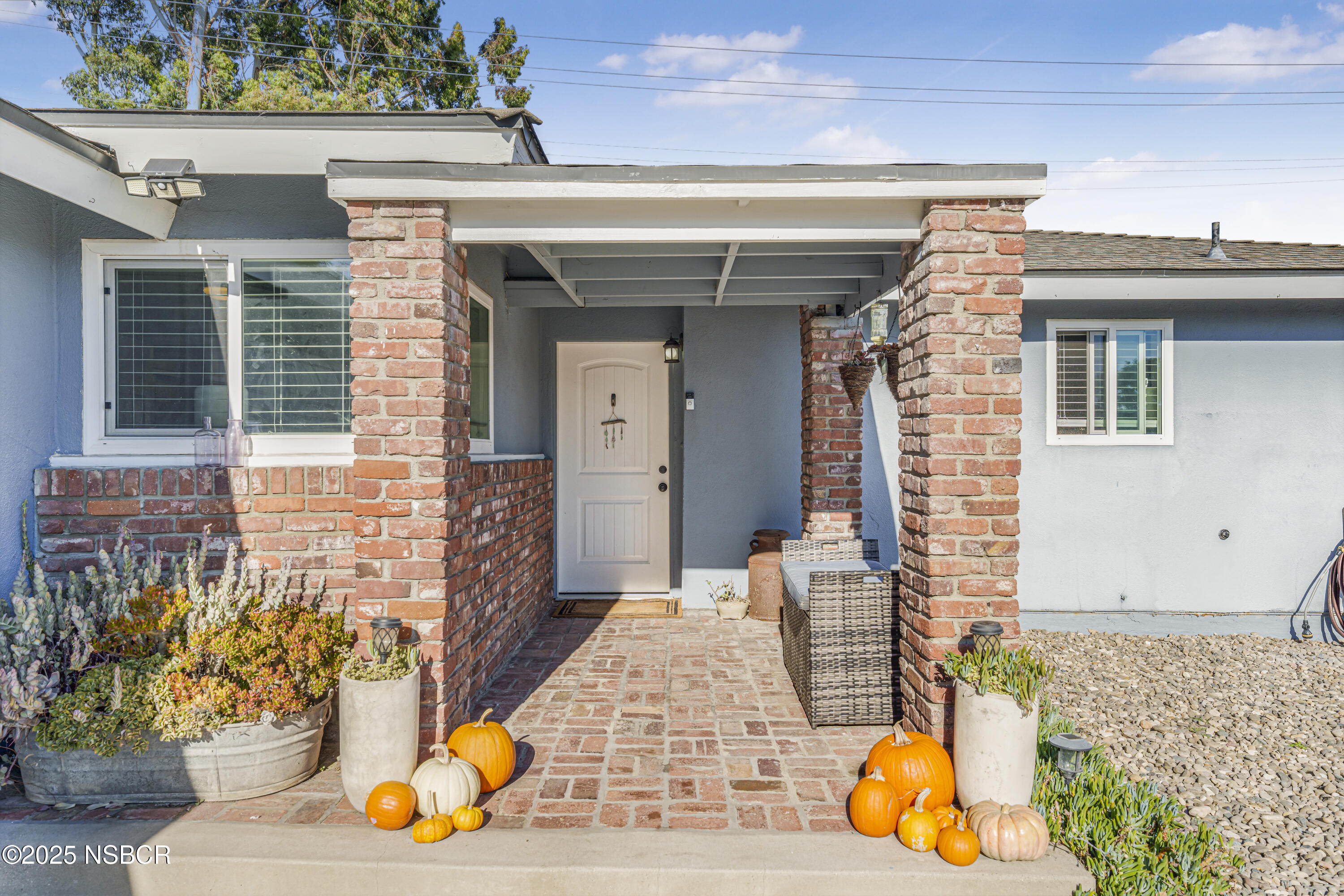 3939 Saturn Avenue Lompoc, CA 93436 - Photo 3 of 26 a front view of a house with outdoor seating