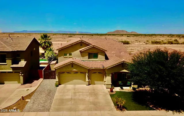 a view of a house with a ocean view