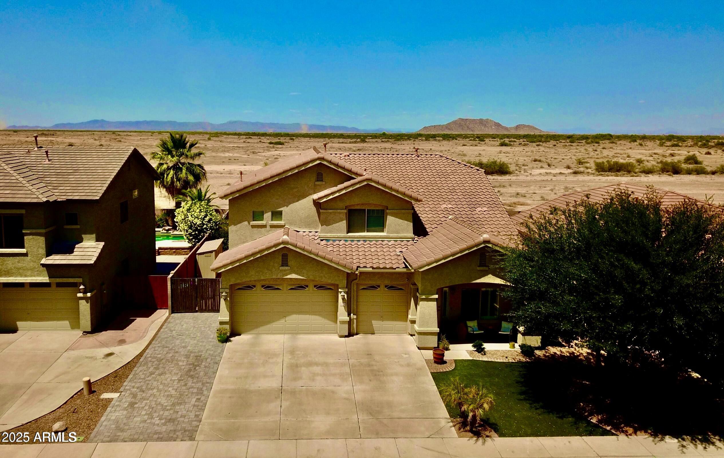 a view of a house with a ocean view