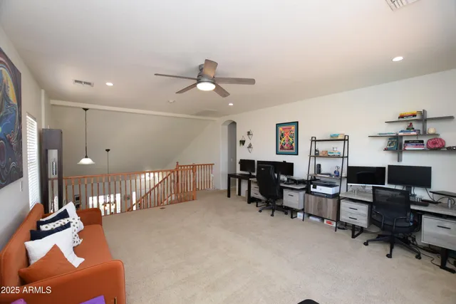 a view of a swimming pool and lounge chair