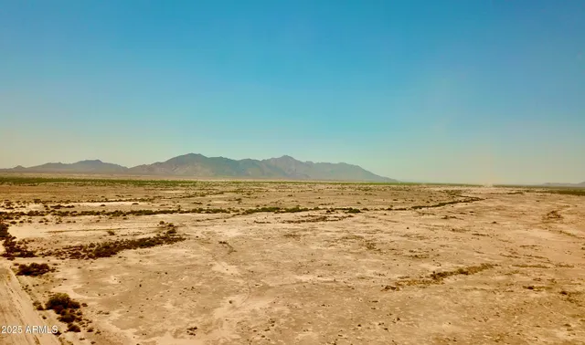 an aerial view of balcony with outdoor seating