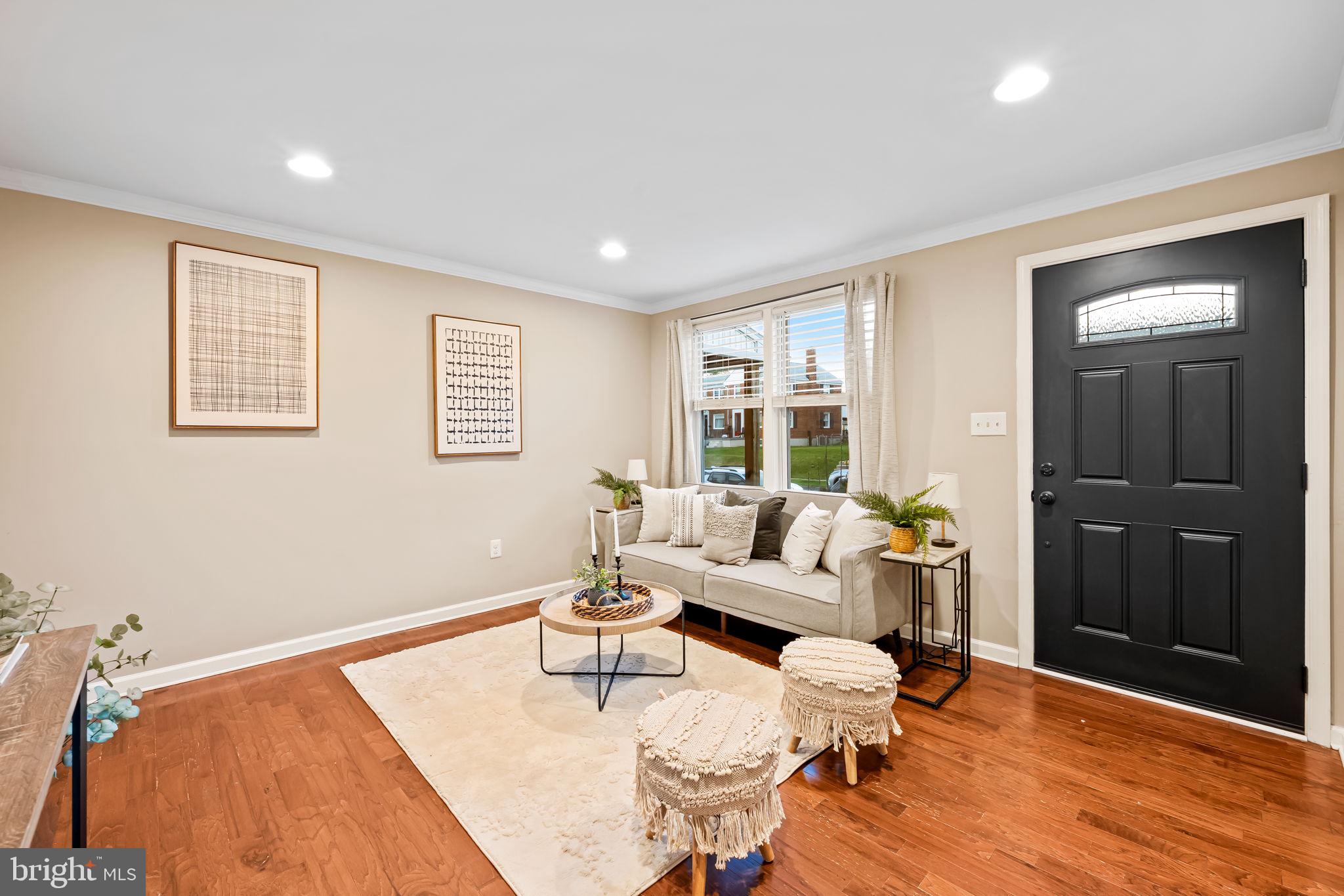 1817 Dunmere Road Baltimore, MD 21222 - Photo 4 of 27 a living room with furniture and wooden floor