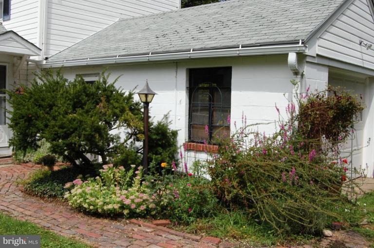 6354 Middle Point Road Neavitt, MD 21652 - Photo 14 of 28 Nice plantings at side of garage