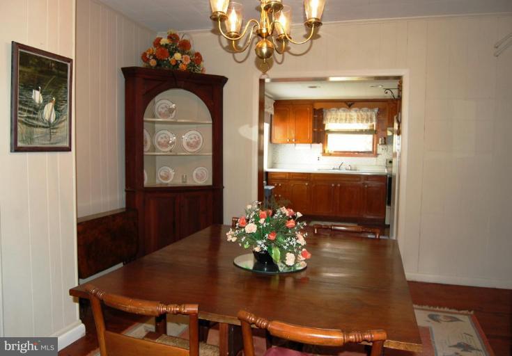 6354 Middle Point Road Neavitt, MD 21652 - Photo 22 of 28 View from dining room to kitchen