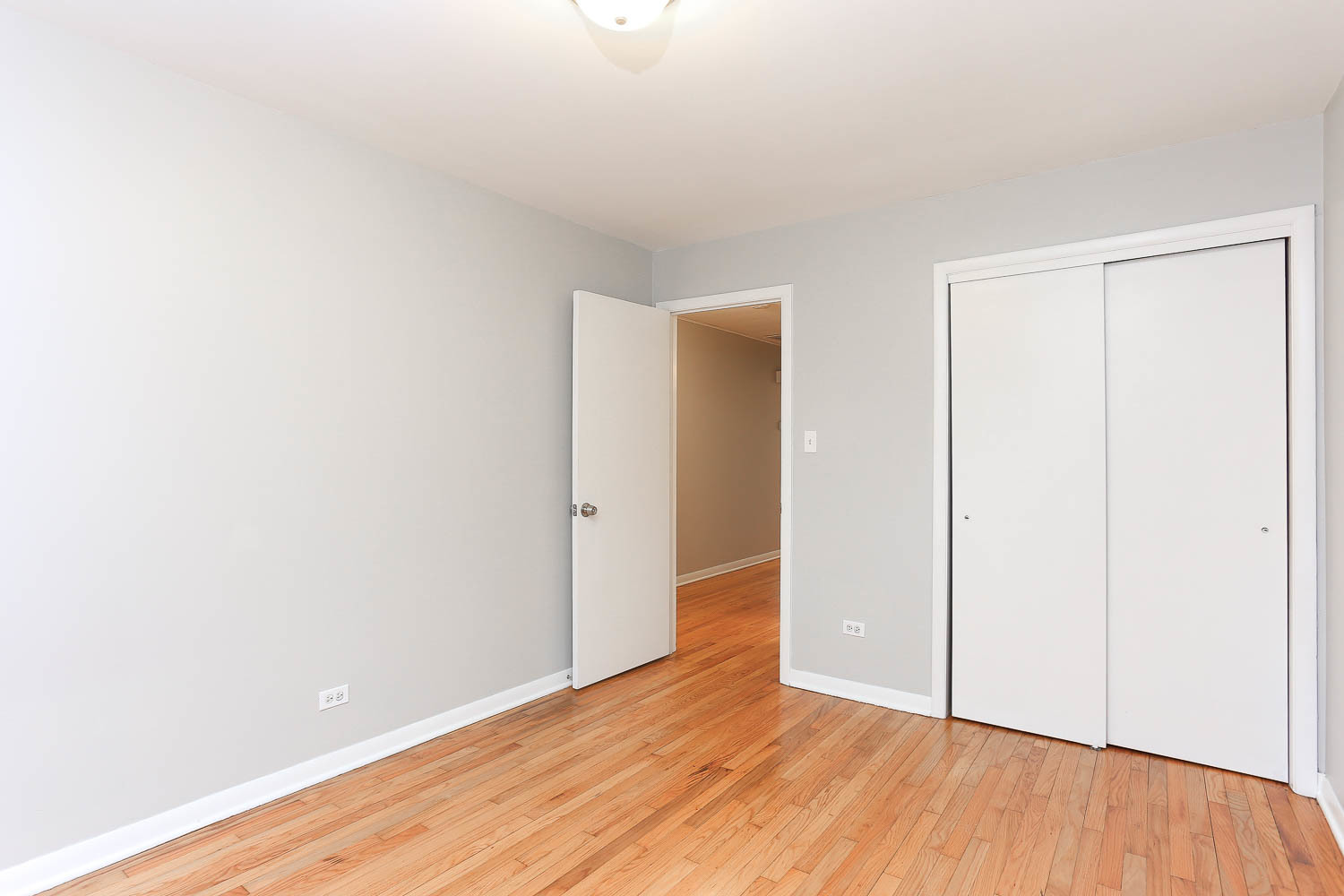 7736 State Road Burbank, IL 60459 - Photo 17 of 20 a view of an empty room with wooden floor
