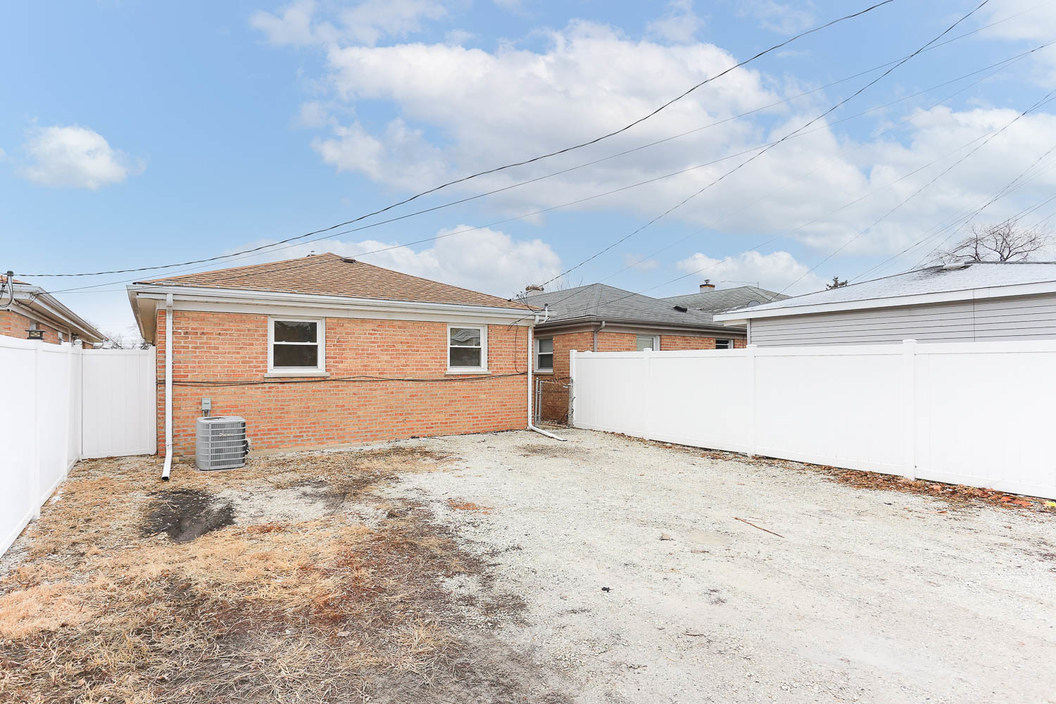 7736 State Road Burbank, IL 60459 - Photo 19 of 20 a view of a house with a snow in the background