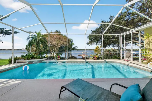 a view of a terrace with a table and chairs
