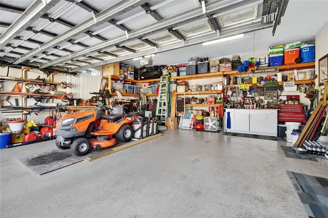 a front view of a house with a yard table and chairs