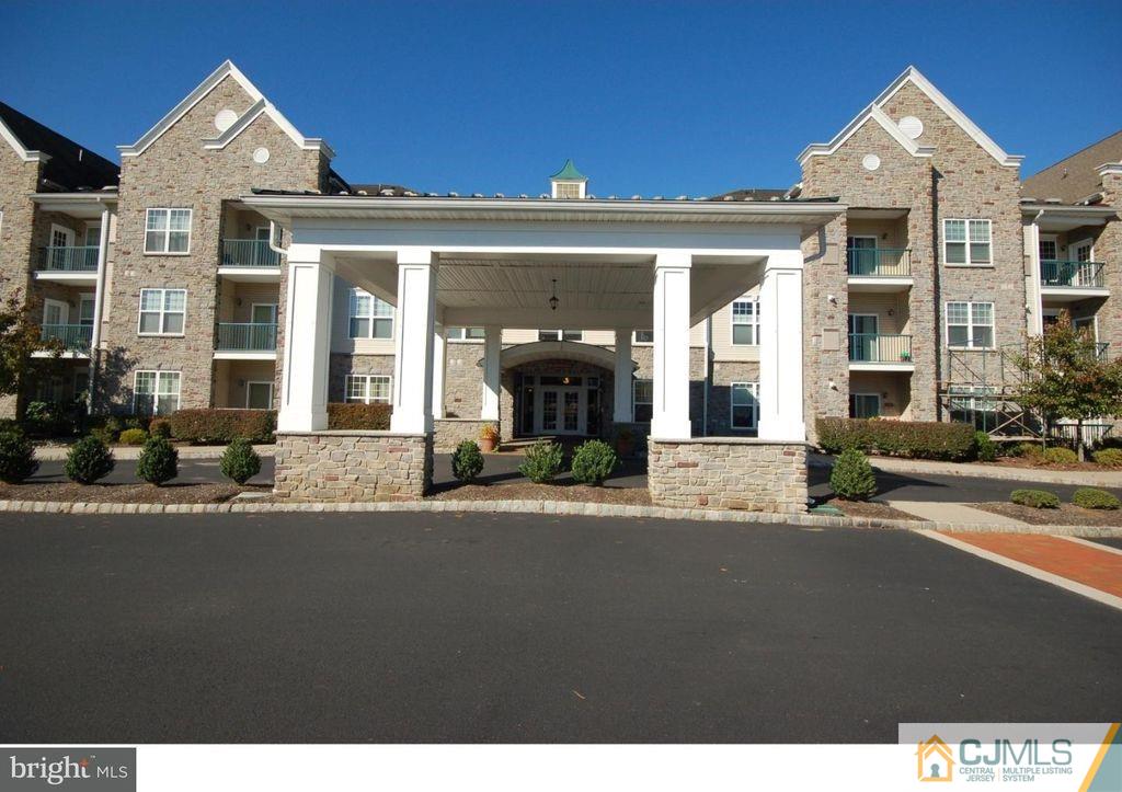 a front view of a house with a outdoor space