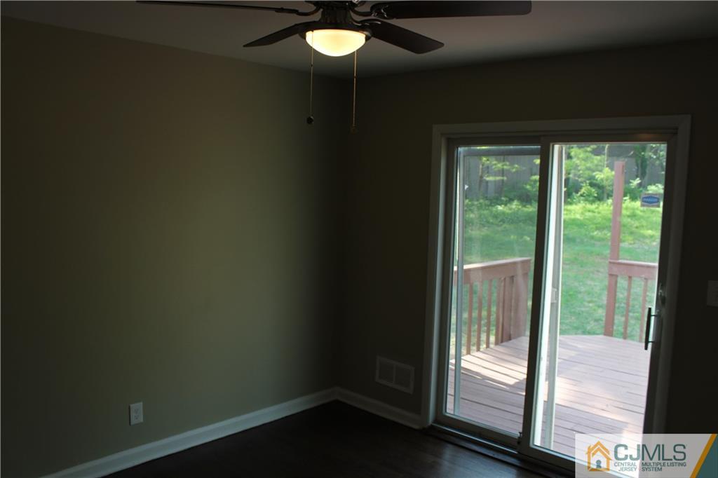 23 Roberts Road New Brunswick, NJ 08901 - Photo 8 of 22 a view of entryway with wooden floor