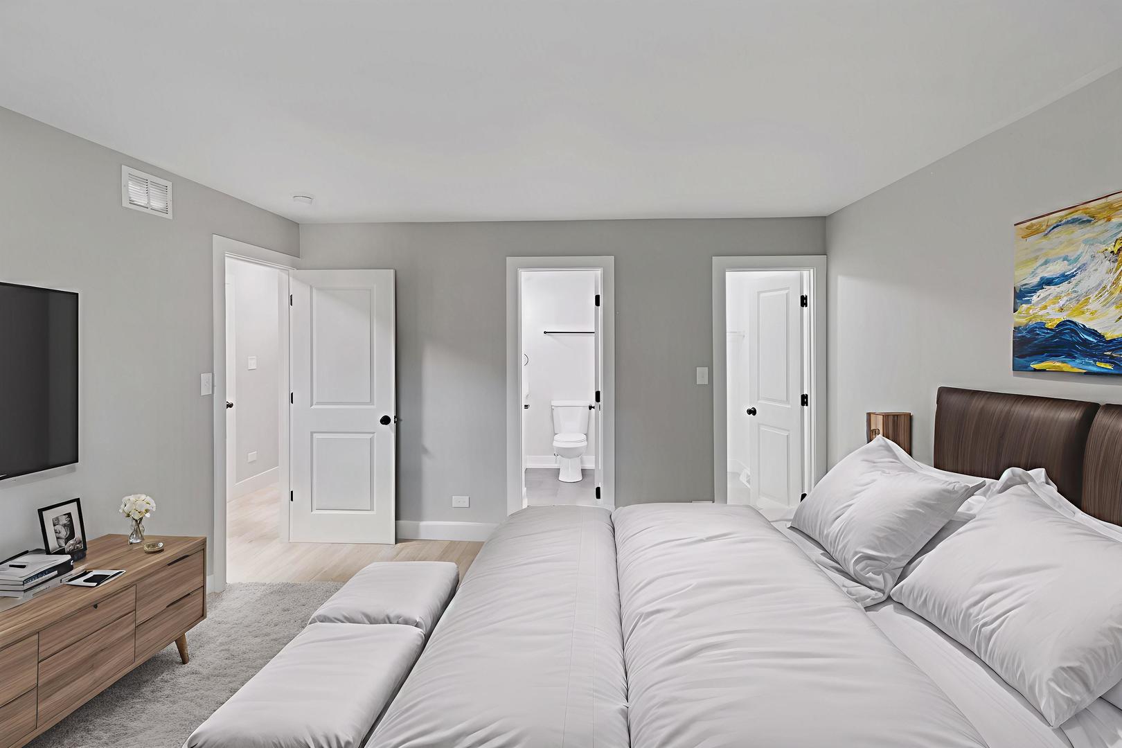 28W555 Leverenz Road Naperville, IL 60564 - Photo 18 of 24 a bedroom with a bed and a couch