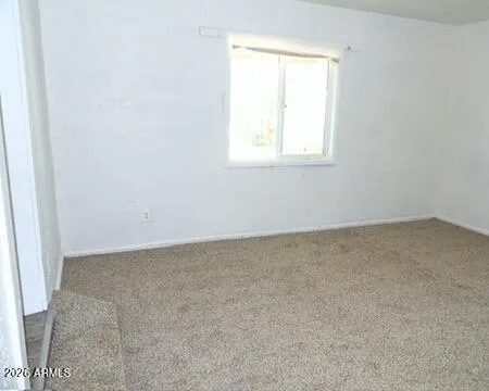 an empty room with a window