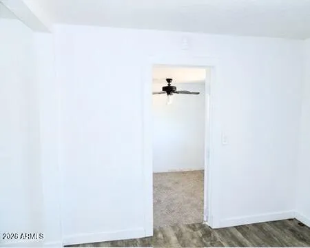 a view of balcony with wooden floor
