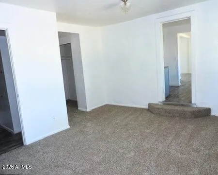 an empty room with a door
