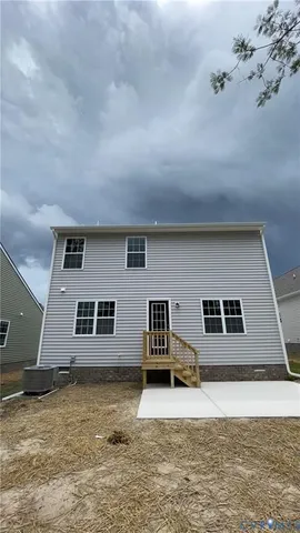 a house with trees in the background