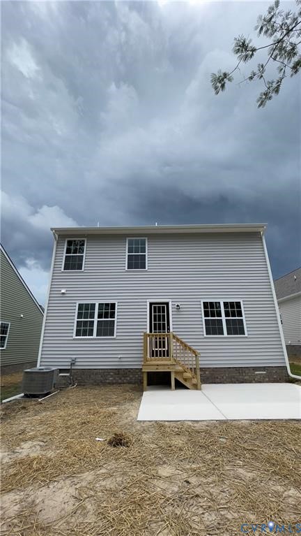 4944 Bailey Woods Lane Midlothian, VA 23112 - Photo 12 of 50 a house with trees in the background