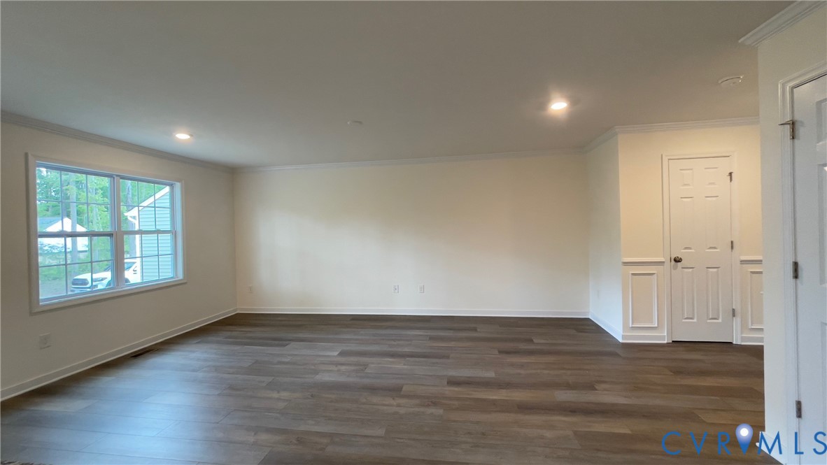 4944 Bailey Woods Lane Midlothian, VA 23112 - Photo 22 of 50 an empty room with wooden floor and windows