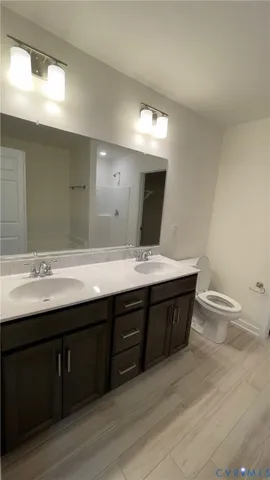 a view of bathroom and a sink